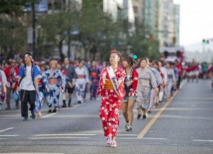 Canada Day parade in Vancouver. Canadians of Chinese origin display their costumes and culture